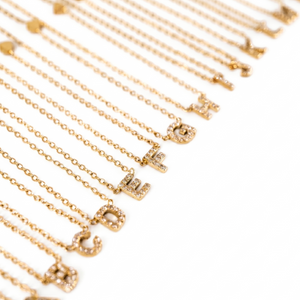 GOLD DEMURE LETTER NECKLACE