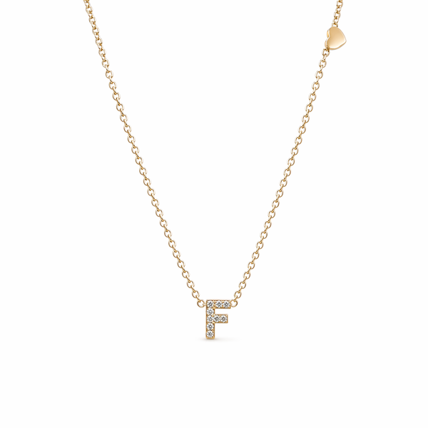 GOLD DEMURE LETTER NECKLACE